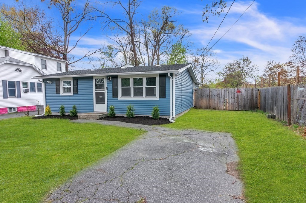 284 Ambrose Street Springfield, MA 01109 - Photo 3 of 29 a front view of house with yard and green space
