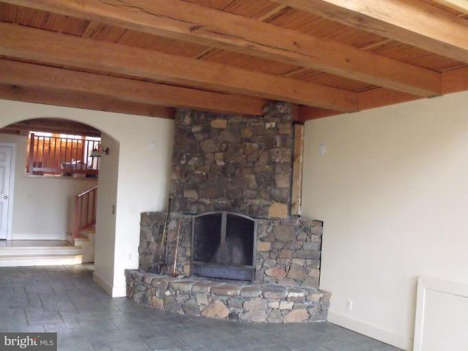4470 Carrington Road Markham, VA 22643 - Photo 7 of 18 Stone masonry wood burning fireplace.