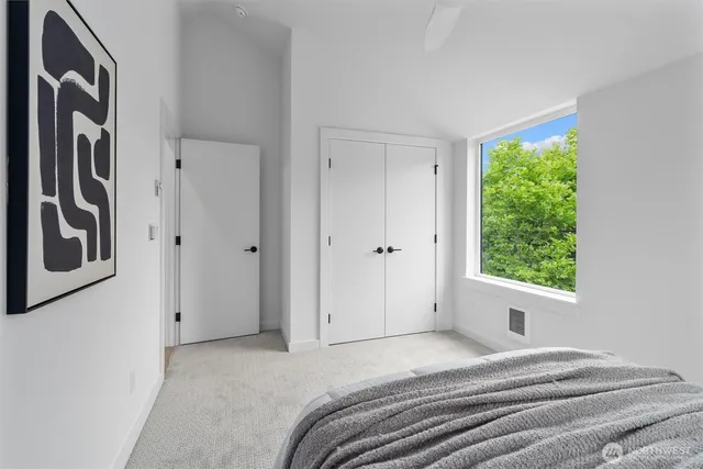 a view of a bedroom with window