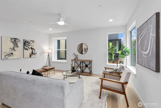 a living room with furniture and a window