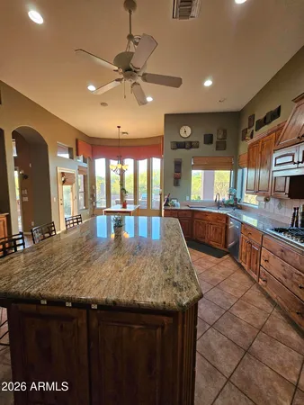 a view of a kitchen counter top and living room