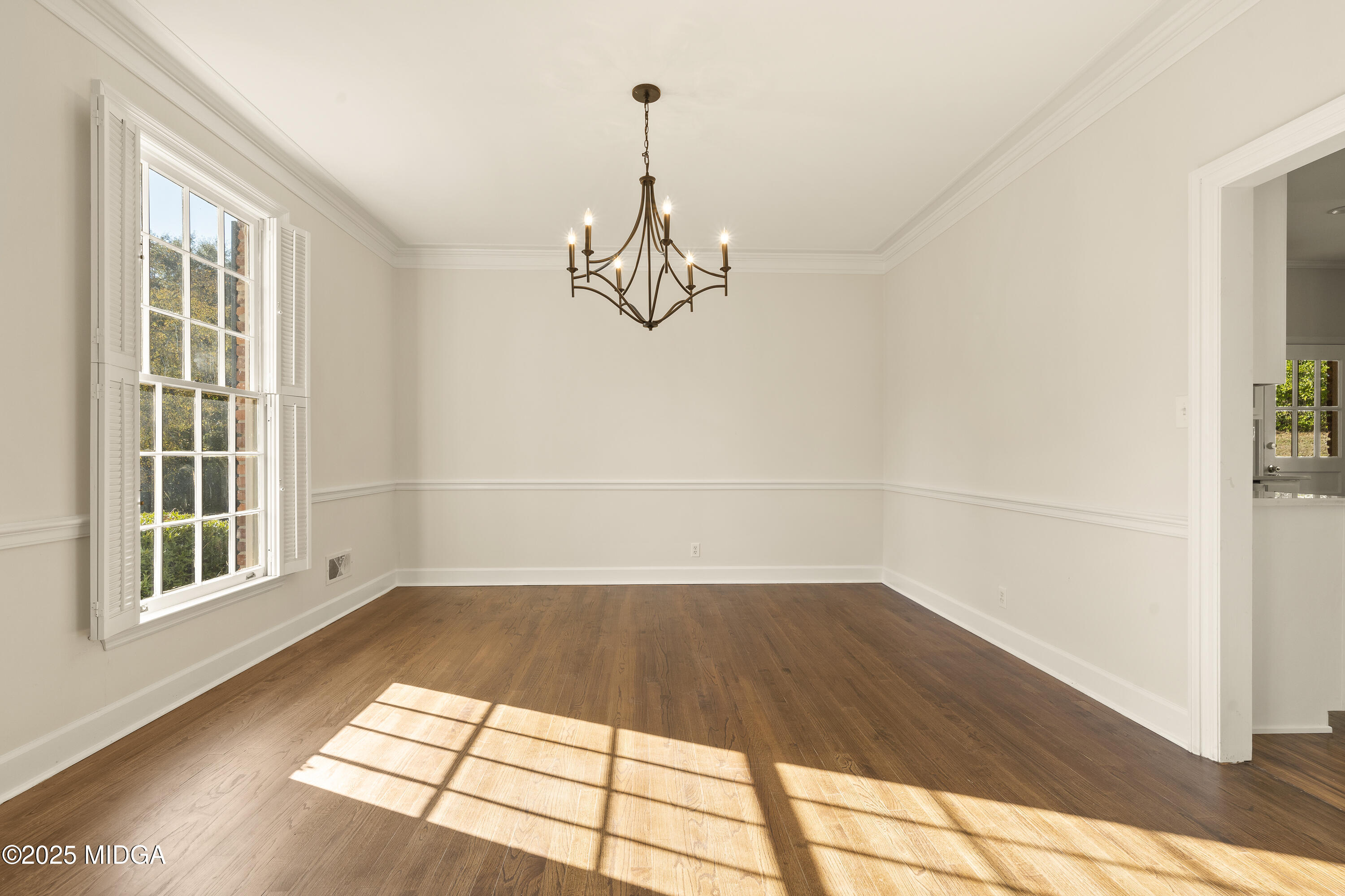 620 Rosa Taylor Drive Macon, GA 31204 - Photo 12 of 45 a view of a room with wooden floor and white walls