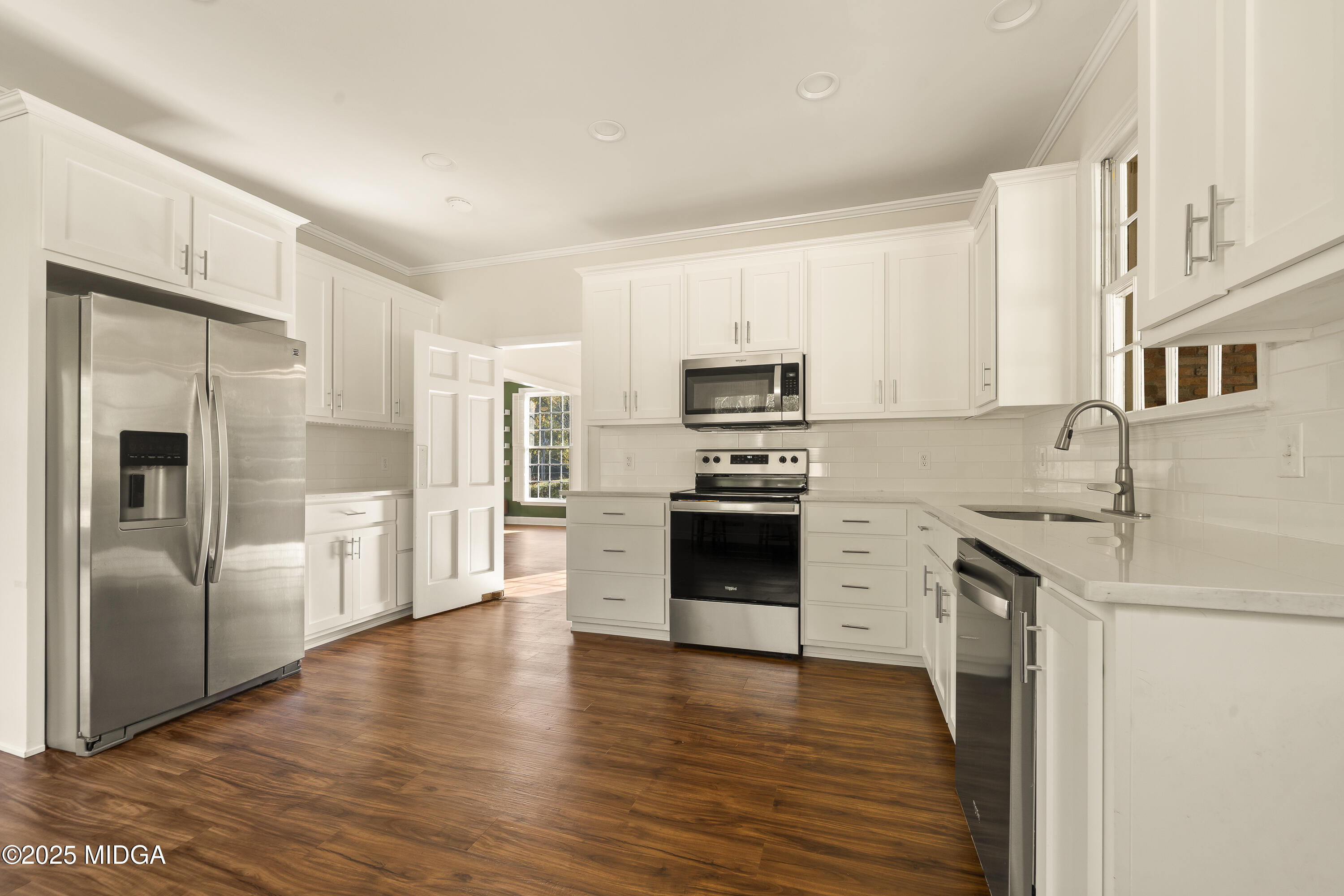 620 Rosa Taylor Drive Macon, GA 31204 - Photo 16 of 45 a kitchen with stainless steel appliances a refrigerator stove and sink