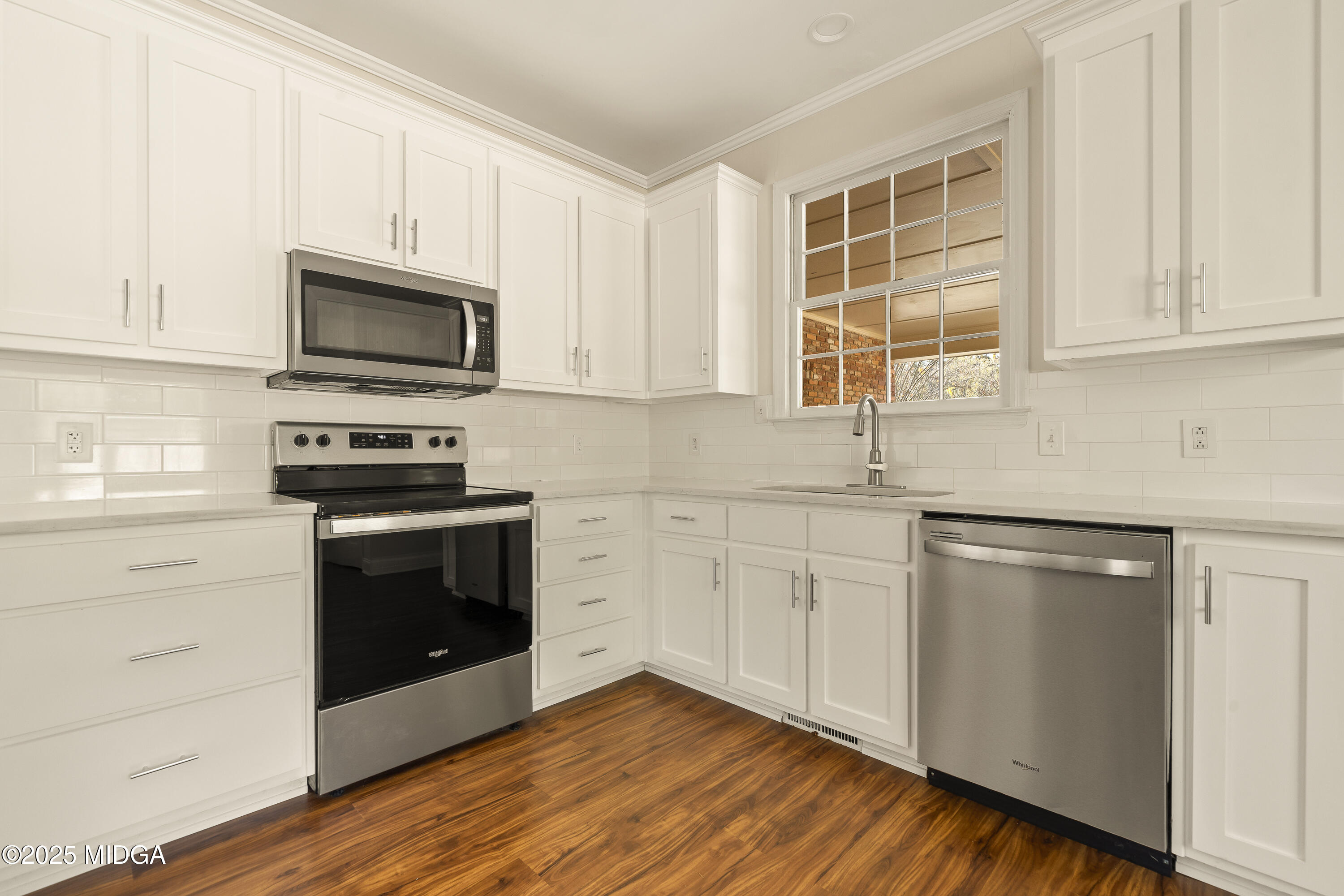 620 Rosa Taylor Drive Macon, GA 31204 - Photo 17 of 45 a kitchen with granite countertop cabinets stainless steel appliances and a sink