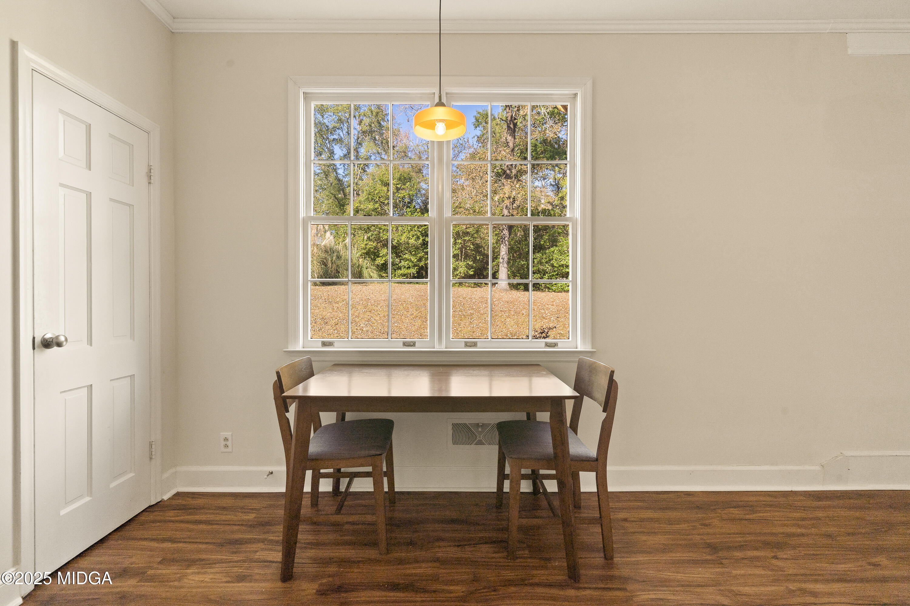 620 Rosa Taylor Drive Macon, GA 31204 - Photo 19 of 45 a view of a dining room with furniture window and wooden floor