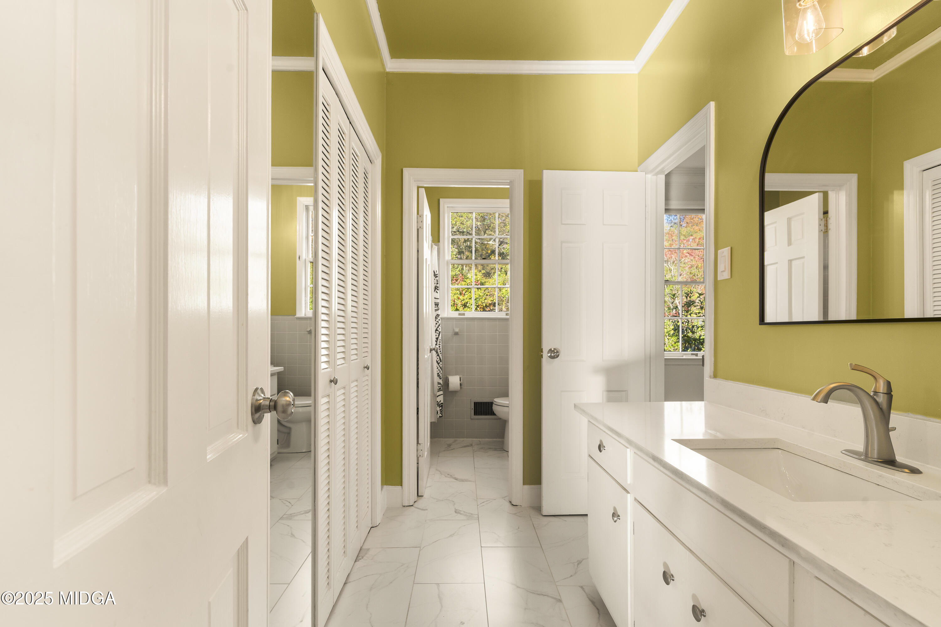 620 Rosa Taylor Drive Macon, GA 31204 - Photo 37 of 45 a spacious bathroom with a sink and a mirror