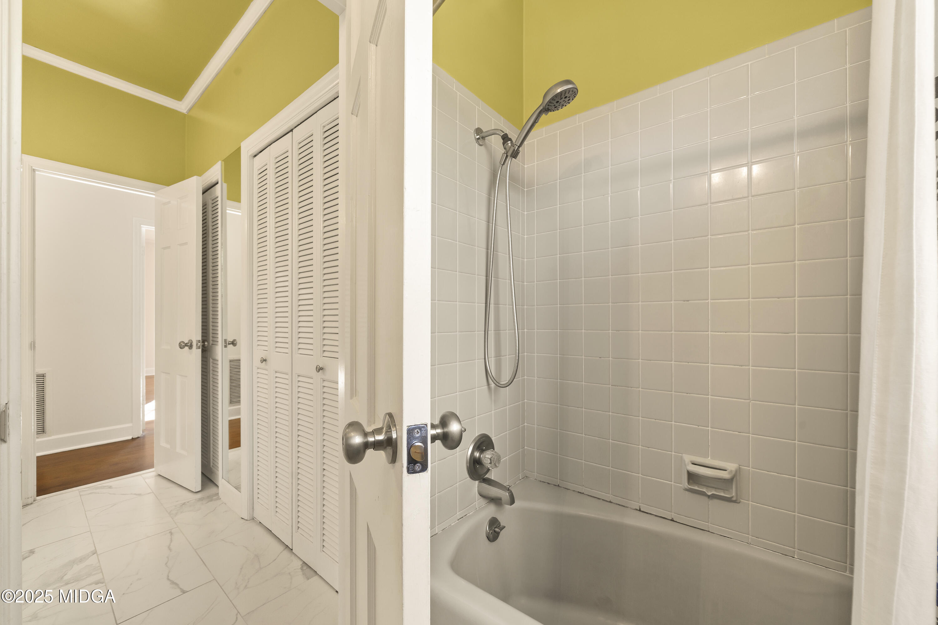 620 Rosa Taylor Drive Macon, GA 31204 - Photo 41 of 45 a bathroom with a bathtub and a shower