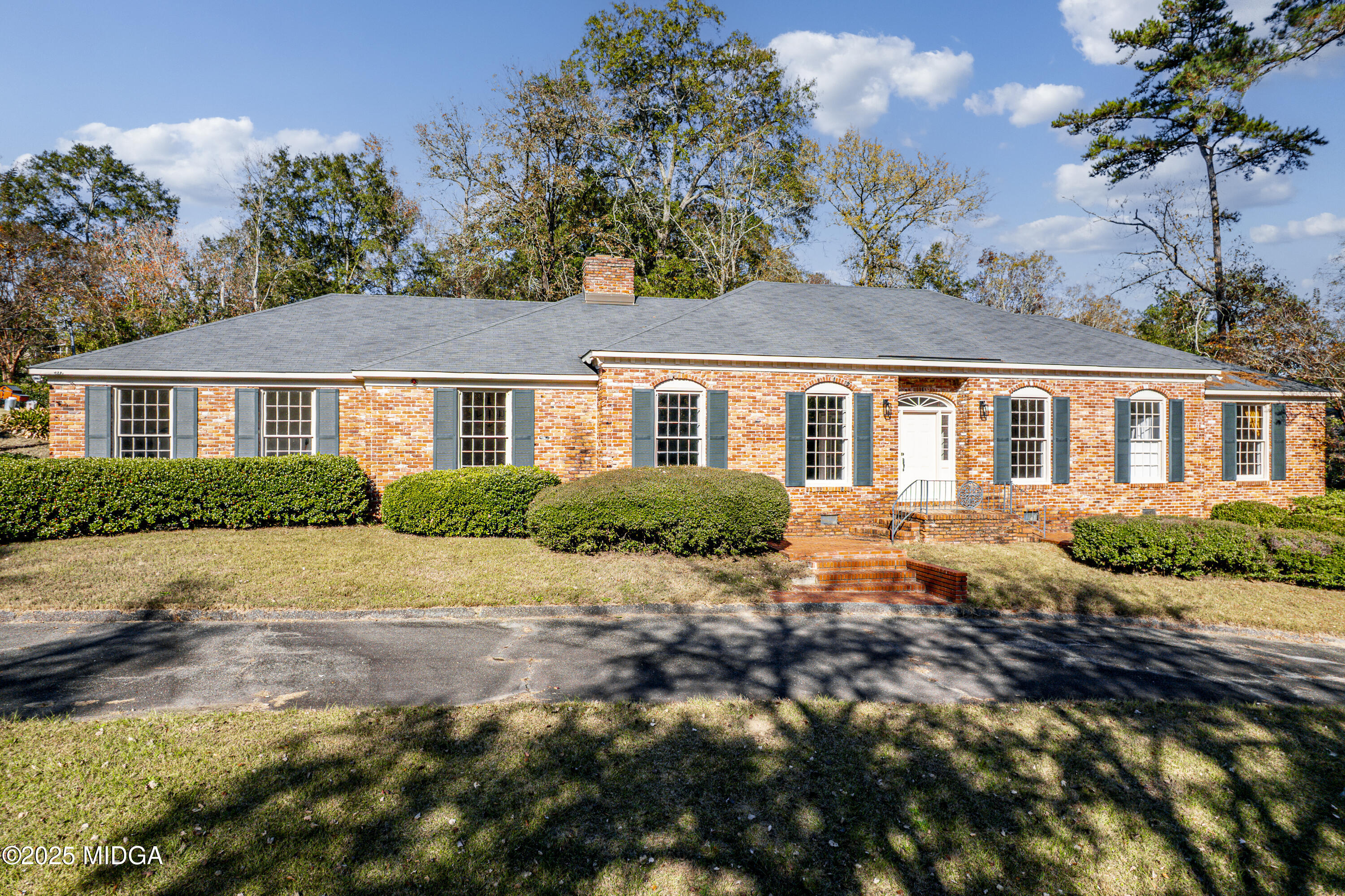 620 Rosa Taylor Drive Macon, GA 31204 - Photo 45 of 45 a front view of a house with a yard and potted plants