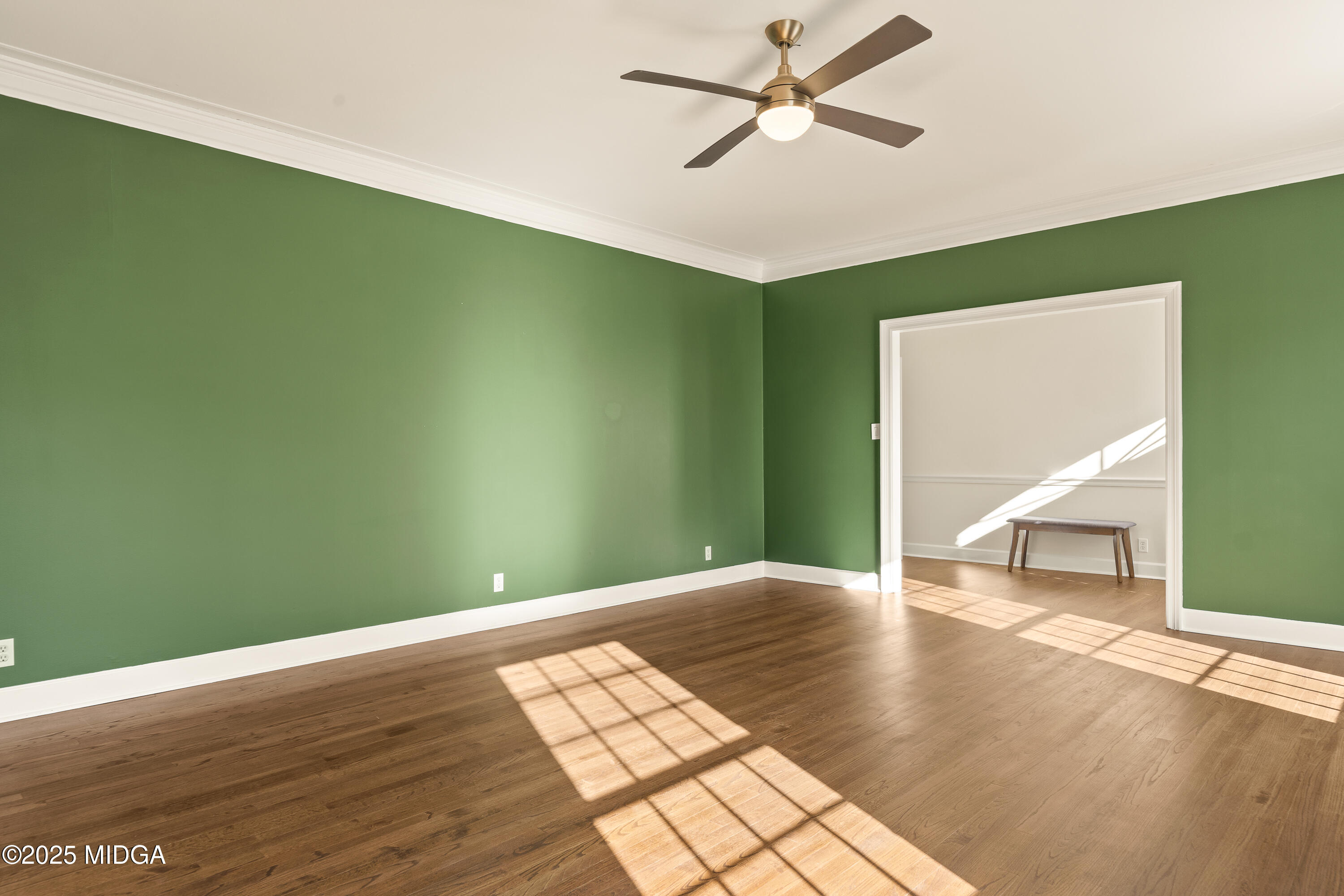 620 Rosa Taylor Drive Macon, GA 31204 - Photo 10 of 45 a view of empty room with wooden floor and fan
