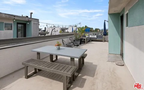 a front view of a building with a lot of windows