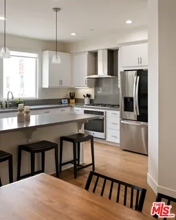a dining room with furniture and wooden floor