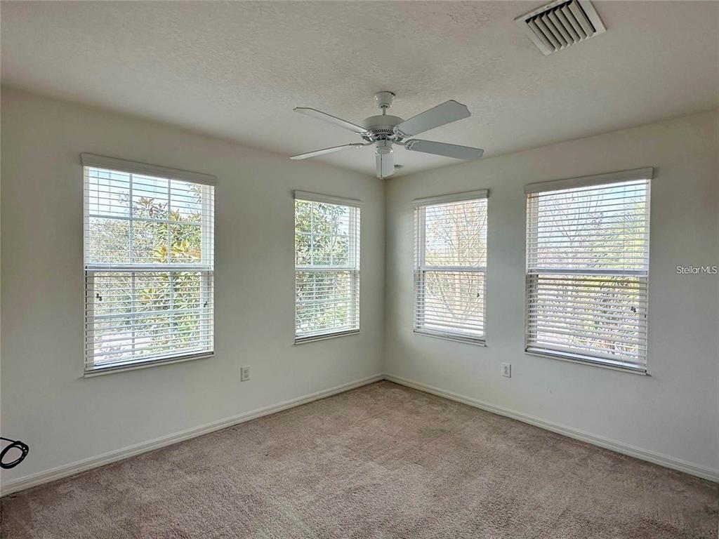 7006 Spotted Deer Place Riverview, FL 33578 - Photo 9 of 21 a view of an empty room with a window