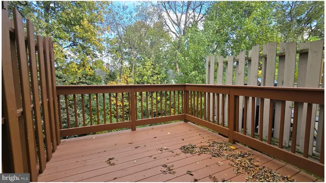 a view of balcony with wooden floor