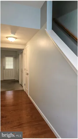 a view of livingroom and hardwood floor