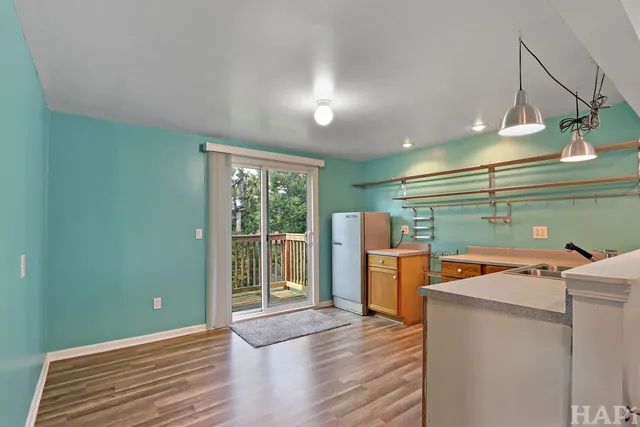 a room with furniture and a window