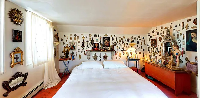 a living room filled with furniture and a window