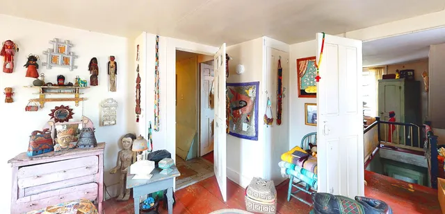 a swimming pool with outdoor seating and yard