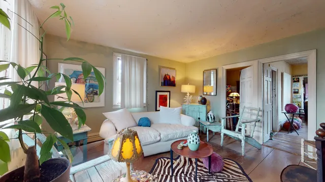 a bathroom with a sink mirror and vanity