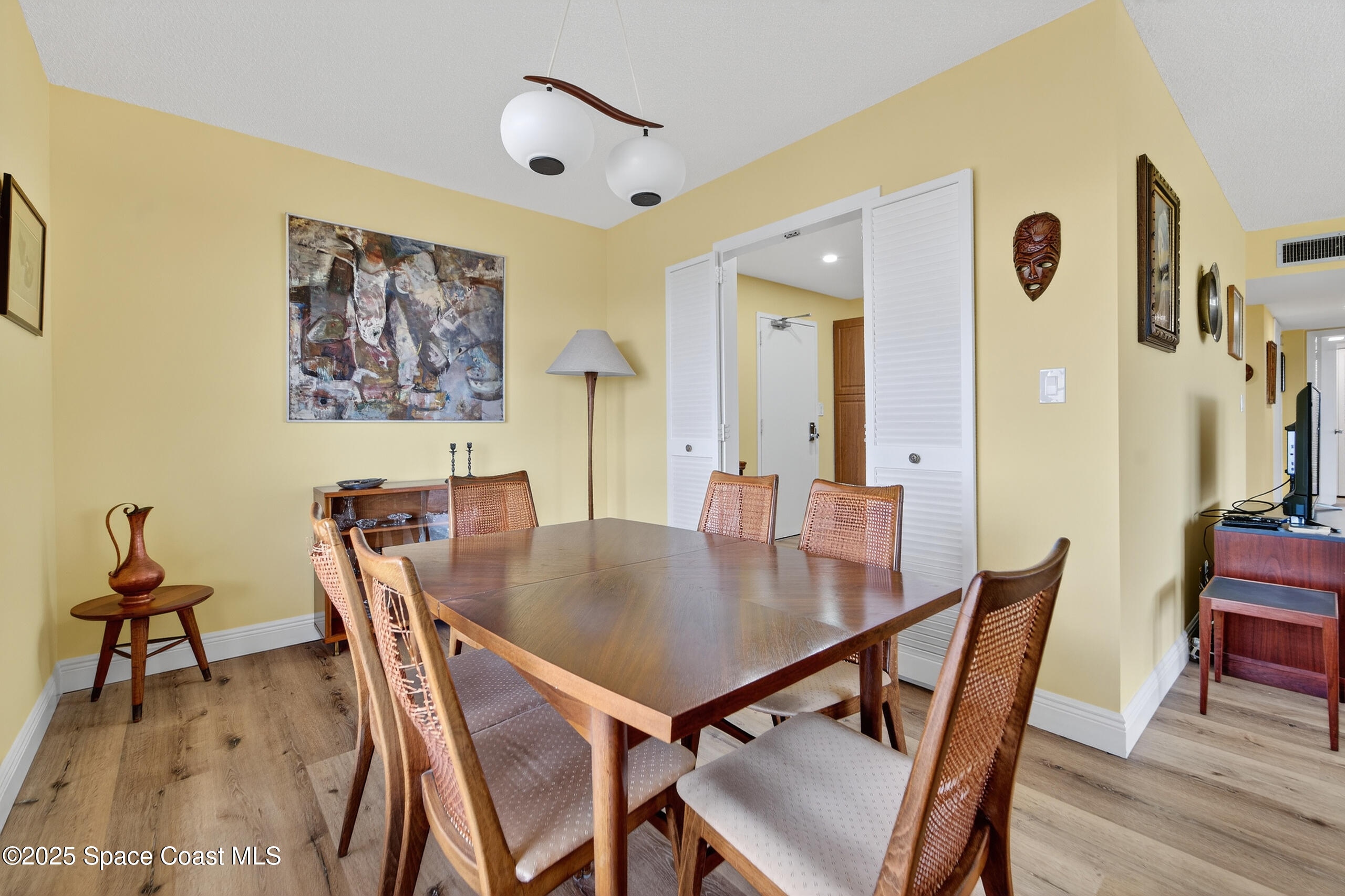 10777 West Sample Road, Unit 1212 Coral Springs, FL 33065 - Photo 11 of 41 a view of a dining room with furniture