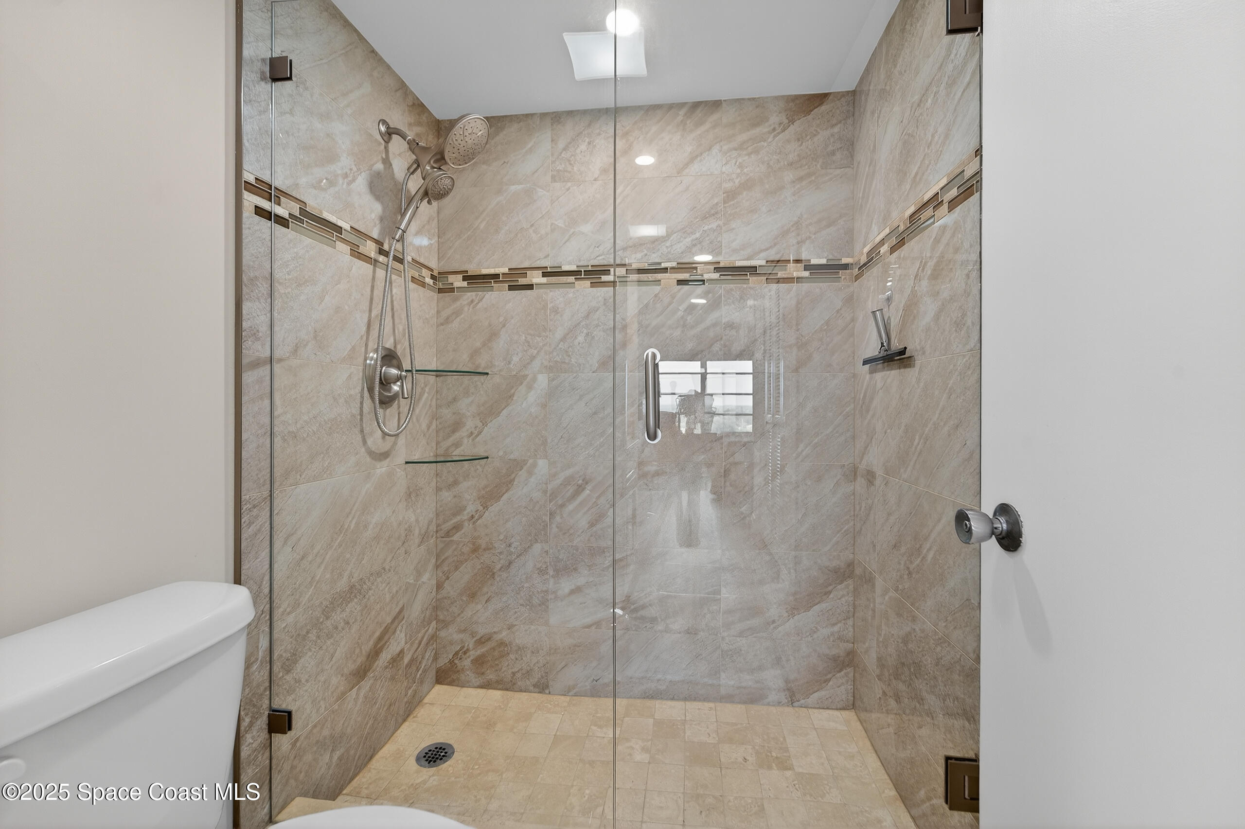 10777 West Sample Road, Unit 1212 Coral Springs, FL 33065 - Photo 19 of 41 a bathroom with a shower