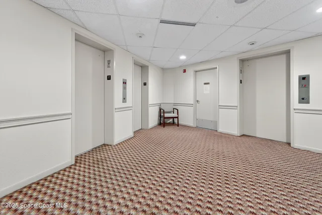 a view of a kitchen with sink washer and dryer