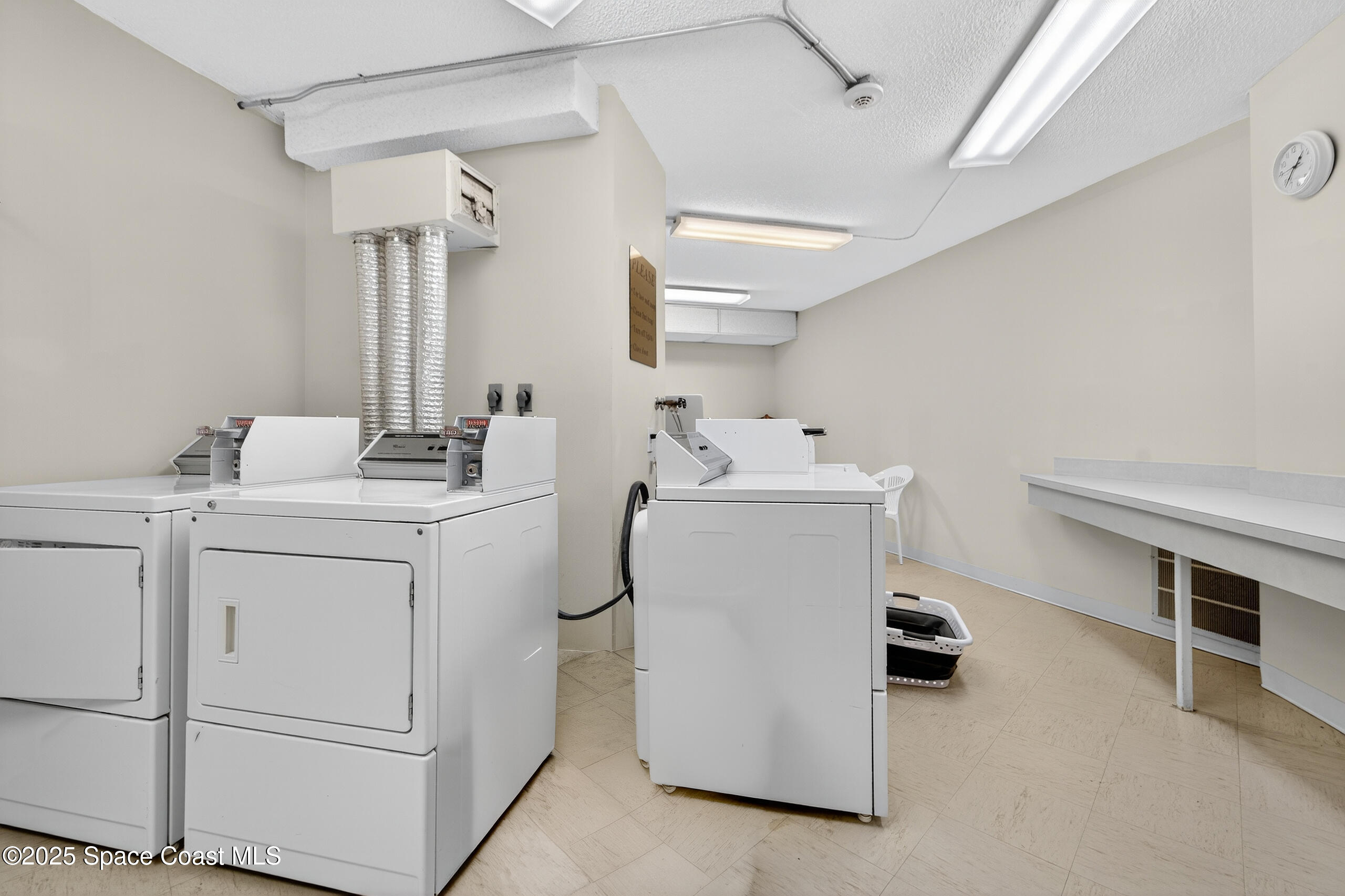 10777 West Sample Road, Unit 1212 Coral Springs, FL 33065 - Photo 28 of 41 a utility room with dryer and washer