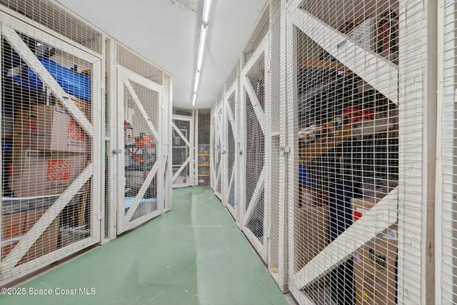 a view of a swimming pool with a lounge chair