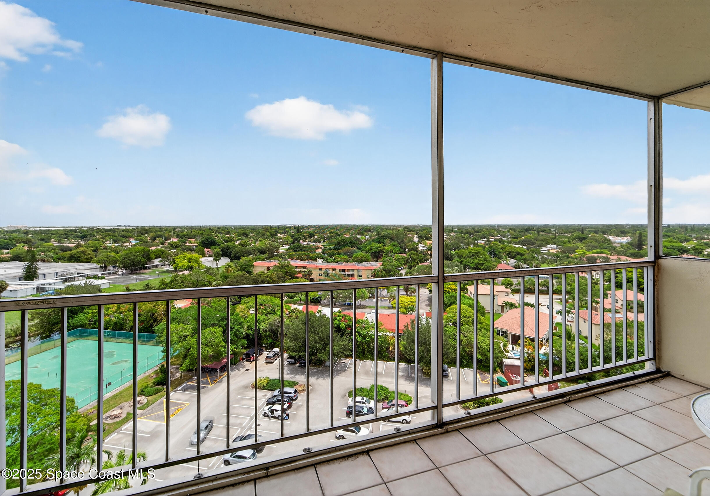10777 West Sample Road, Unit 1212 Coral Springs, FL 33065 - Photo 3 of 41 a view of city from balcony