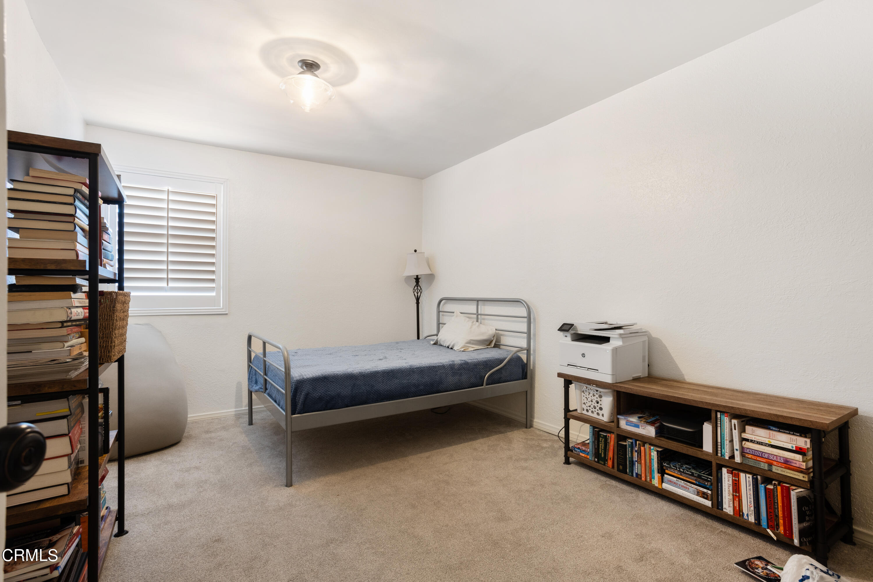 223 Marathon Road Altadena, CA 91001 - Photo 13 of 18 a bedroom with furniture and a window