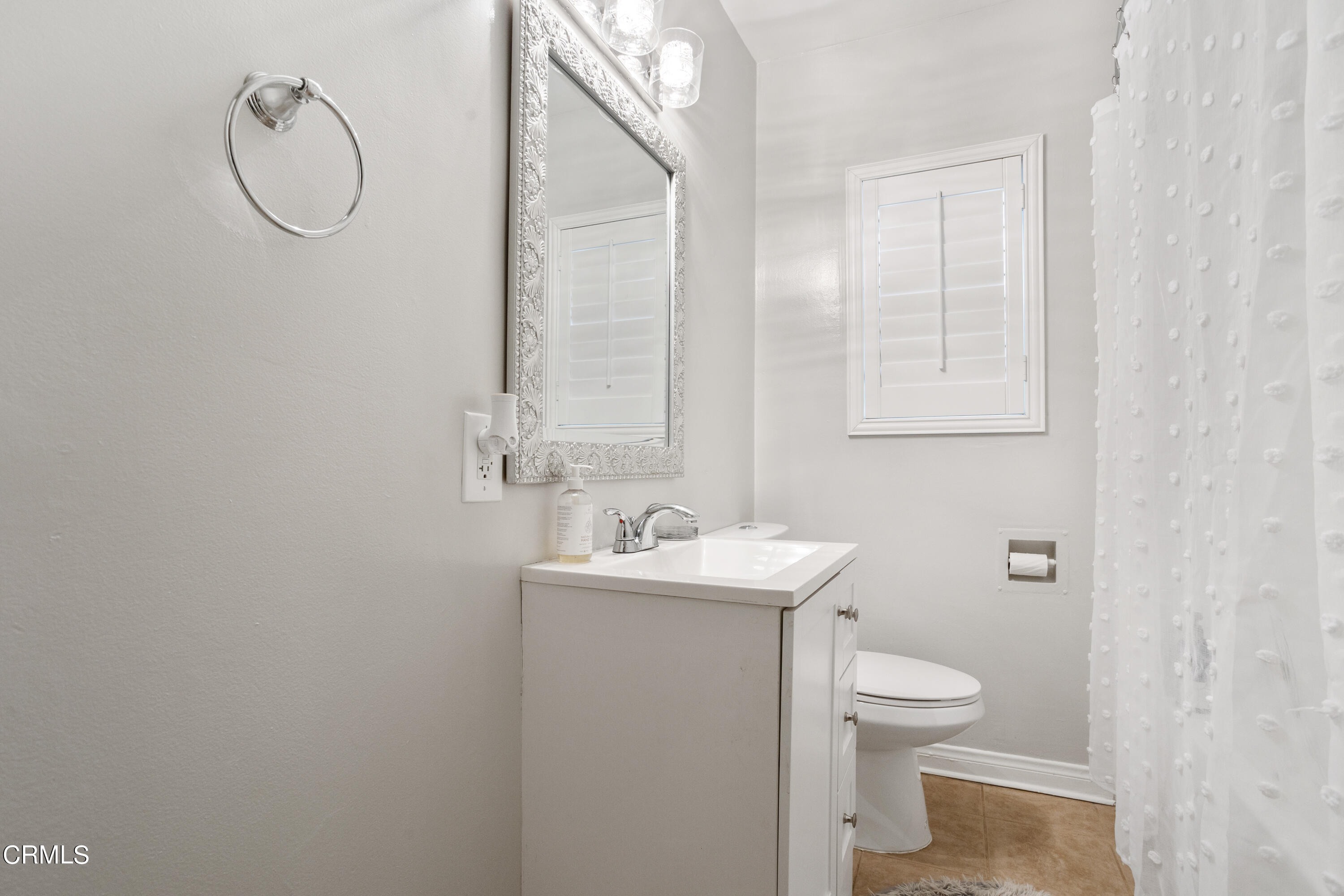 223 Marathon Road Altadena, CA 91001 - Photo 14 of 18 a bathroom with a sink a toilet and a mirror