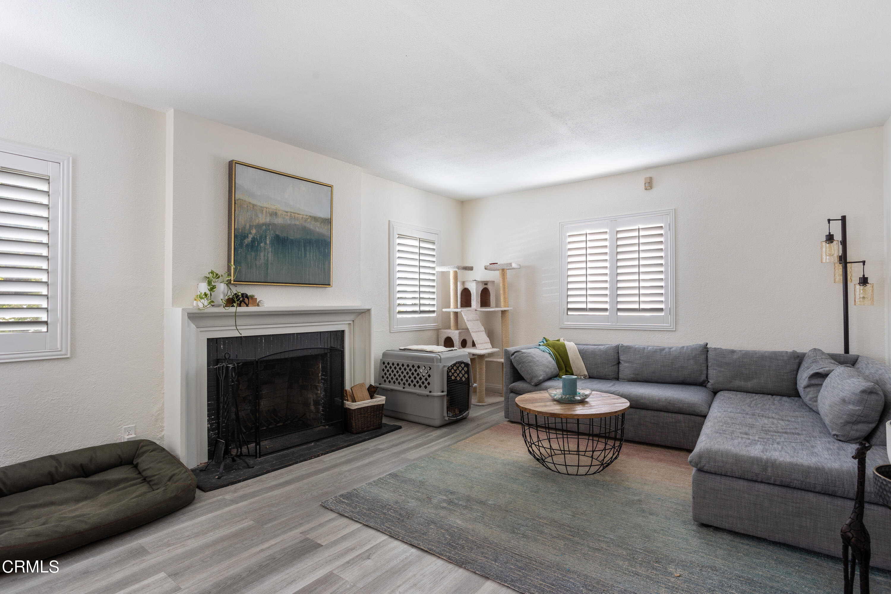 223 Marathon Road Altadena, CA 91001 - Photo 2 of 18 a living room with furniture and a fireplace