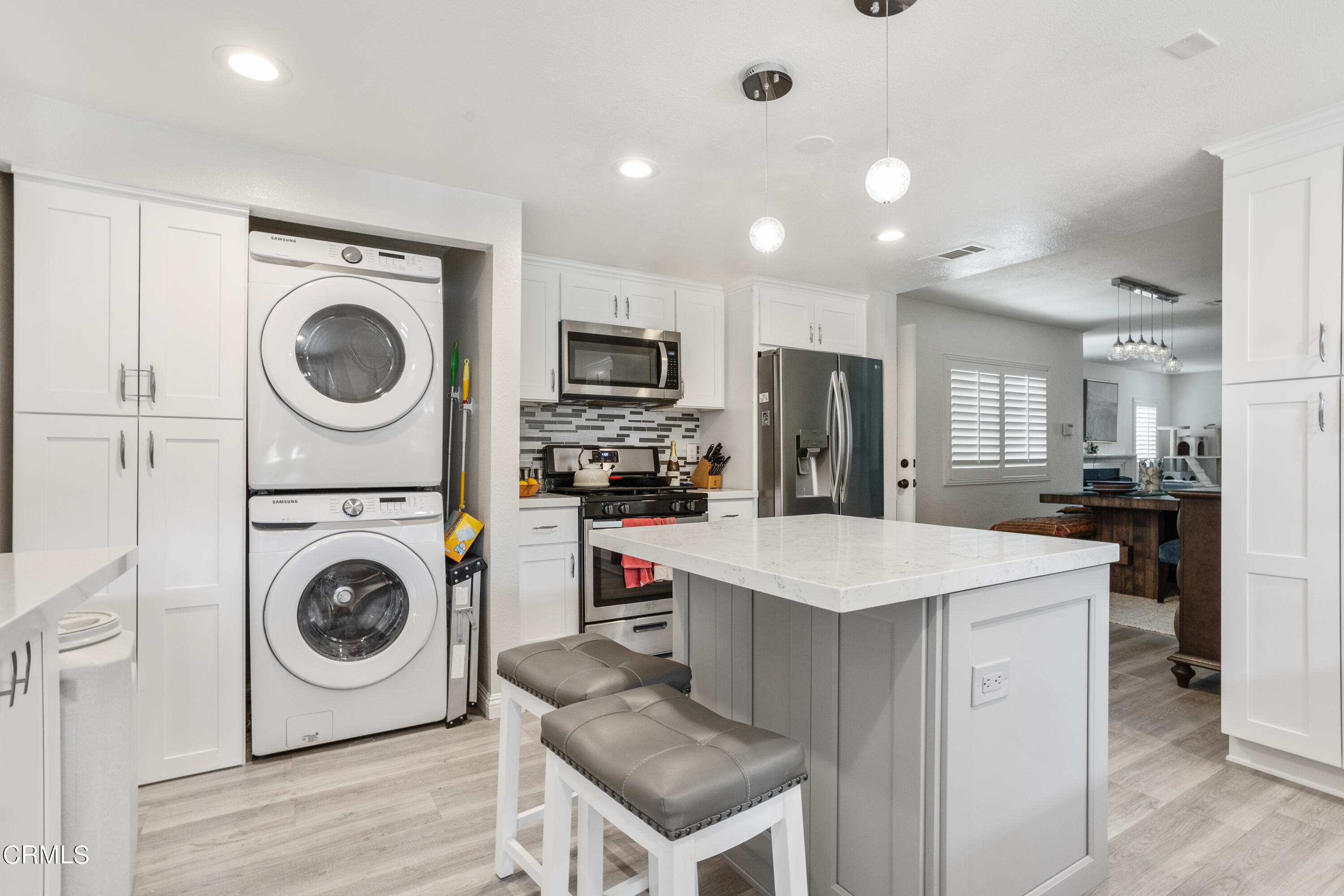 223 Marathon Road Altadena, CA 91001 - Photo 8 of 18 a kitchen with a stove a sink and a refrigerator