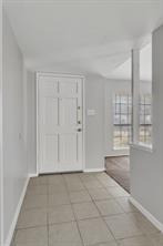 6305 Monahans Court Plano, TX 75023 - Photo 2 of 24 an empty room with windows