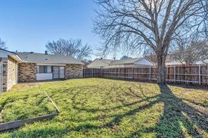 6305 Monahans Court Plano, TX 75023 - Photo 22 of 24 a view of a house with a yard