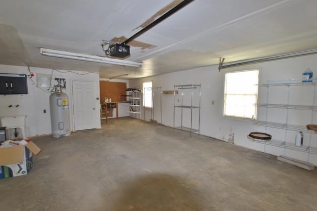 605 Dunaway Road Lebanon, TN 37090 - Photo 13 of 20 Two car attached garage with work space. Detached carport also stays with property.