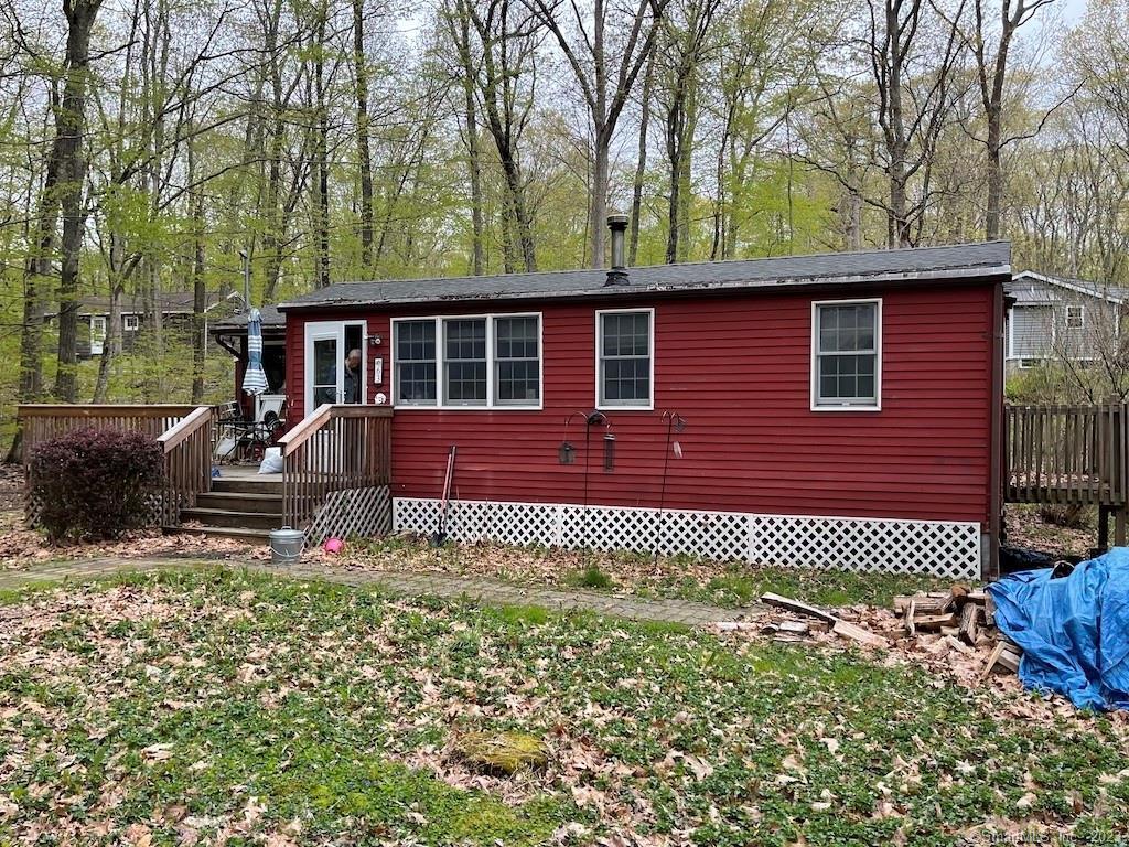 63 Beech Road Lebanon, CT 06249 - Photo 1 of 1 a front view of a house with a yard