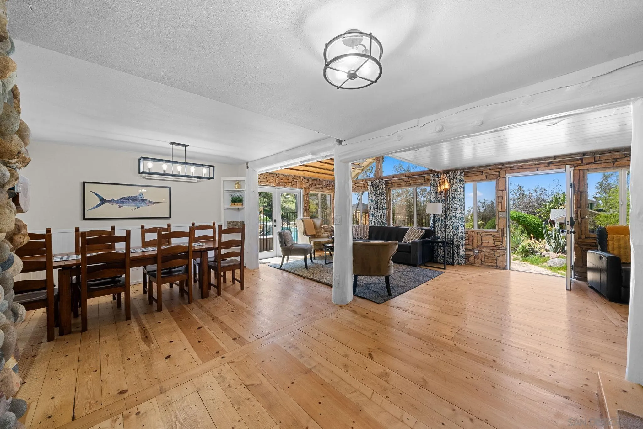 15914 Sequan Truck Trail Alpine, CA 91901 - Photo 13 of 69 a view of a dining area with furniture and chandelier