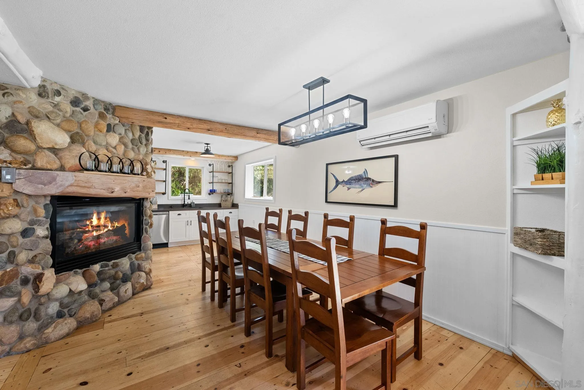 15914 Sequan Truck Trail Alpine, CA 91901 - Photo 16 of 69 a view of a dining room with furniture and wooden floor