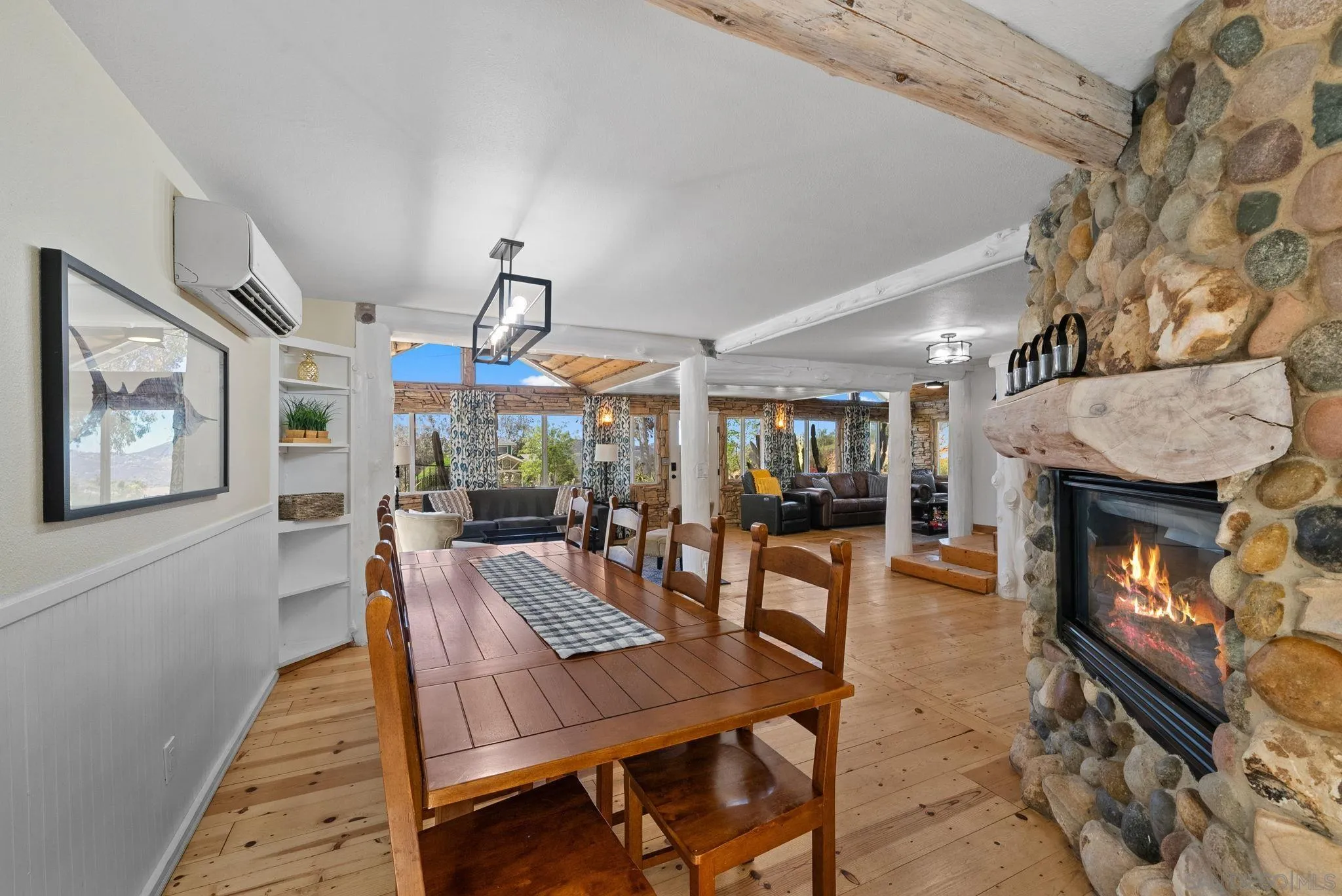 15914 Sequan Truck Trail Alpine, CA 91901 - Photo 17 of 69 a view of a dining room with furniture window and wooden floor