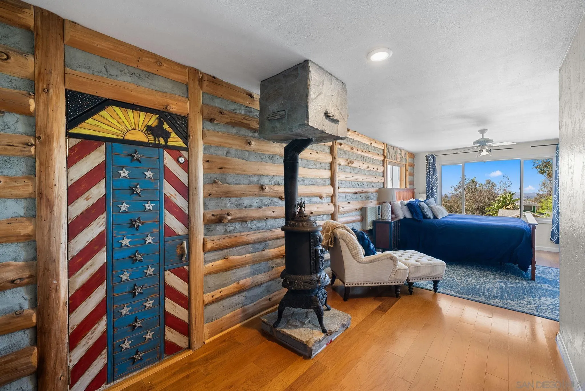 15914 Sequan Truck Trail Alpine, CA 91901 - Photo 21 of 69 a bedroom with furniture and a large window
