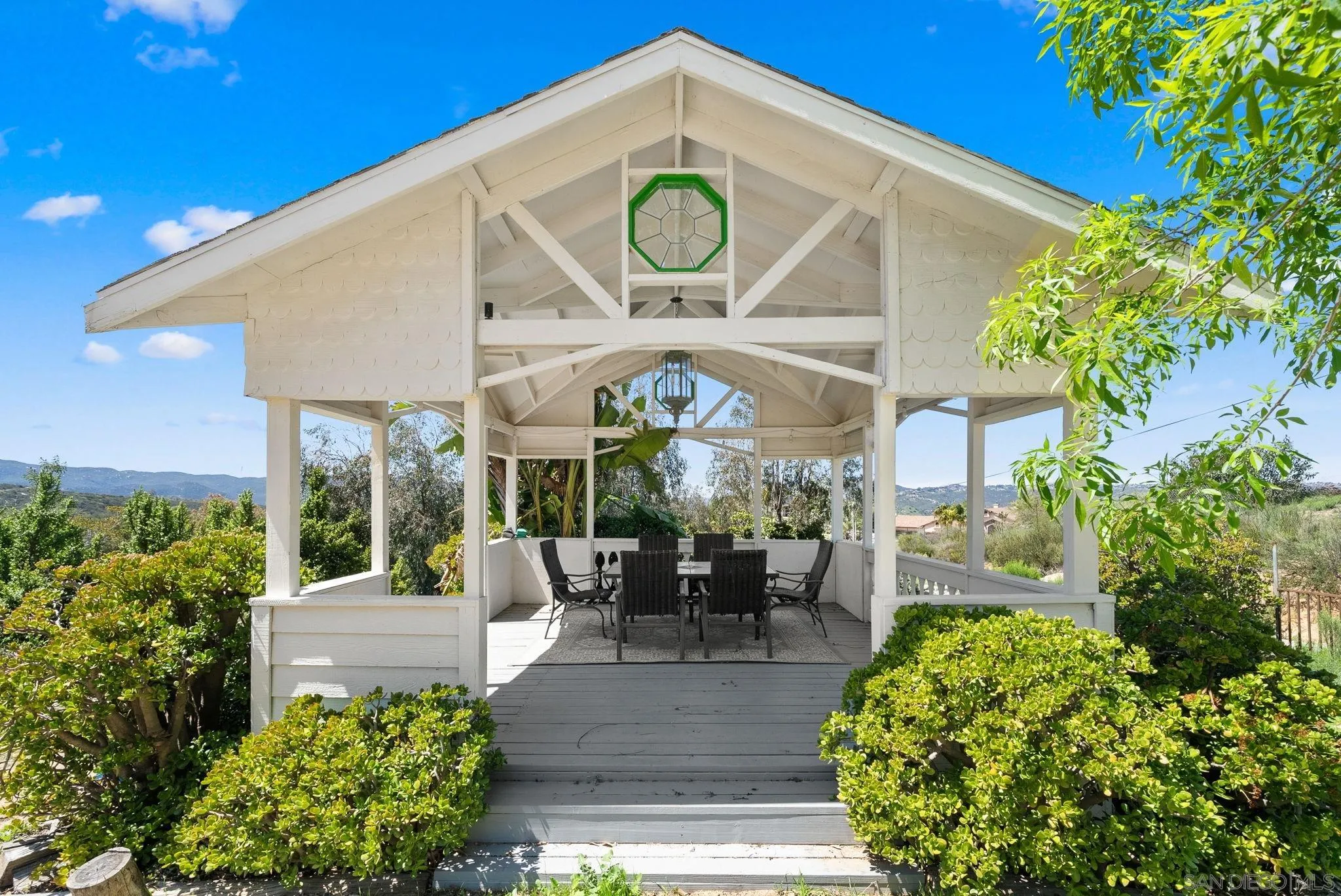15914 Sequan Truck Trail Alpine, CA 91901 - Photo 30 of 69 a view of a sitting area with furniture and garden
