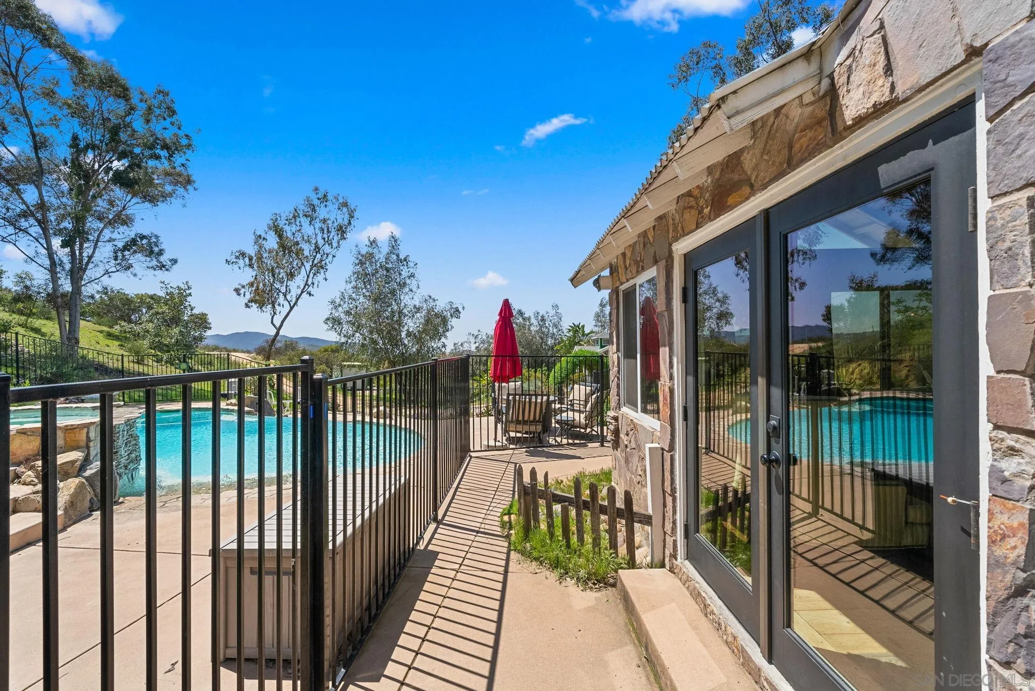 15914 Sequan Truck Trail Alpine, CA 91901 - Photo 34 of 69 a view of a house with backyard from balcony