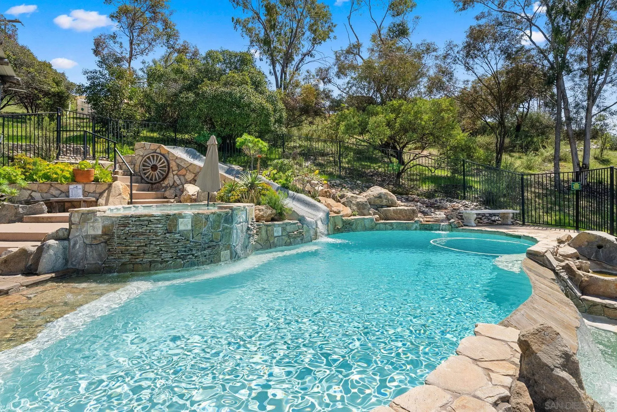 15914 Sequan Truck Trail Alpine, CA 91901 - Photo 38 of 69 a view of backyard with seating area and green space