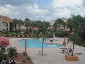13521 Eagle Ridge Drive, Unit 128 Fort Myers, FL 33912 - Photo 4 of 14 a view of a backyard