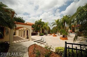 13521 Eagle Ridge Drive, Unit 128 Fort Myers, FL 33912 - Photo 9 of 14 a view of outdoor space with seating area