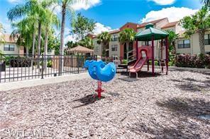 13521 Eagle Ridge Drive, Unit 128 Fort Myers, FL 33912 - Photo 10 of 14 a view of a chairs and tables in patio