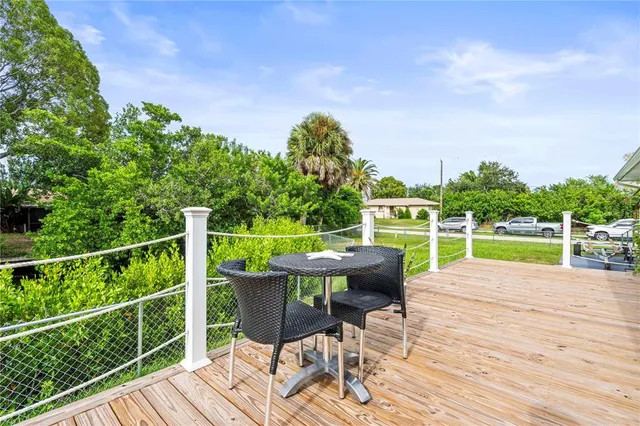 a view of a house with a big yard