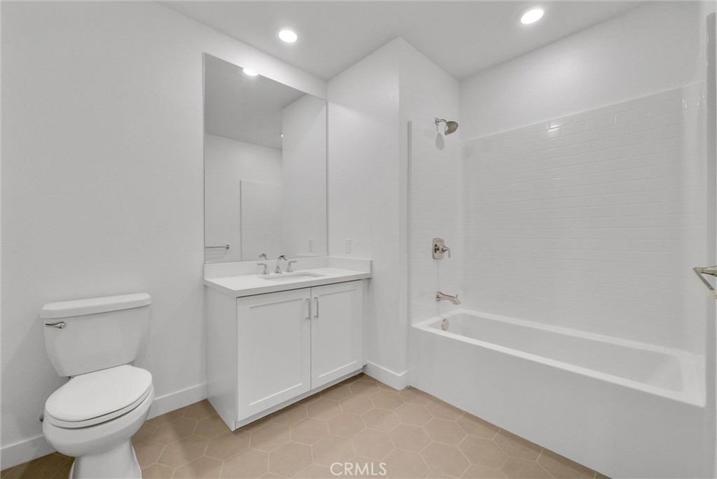4302 Rivington Irvine, CA 92612 - Photo 11 of 63 a bathroom with a sink a toilet and a bathtub