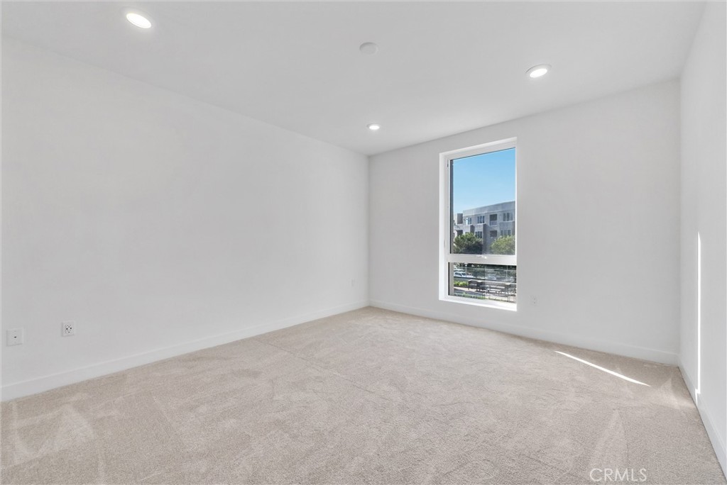4302 Rivington Irvine, CA 92612 - Photo 24 of 63 a view of an empty room with a window