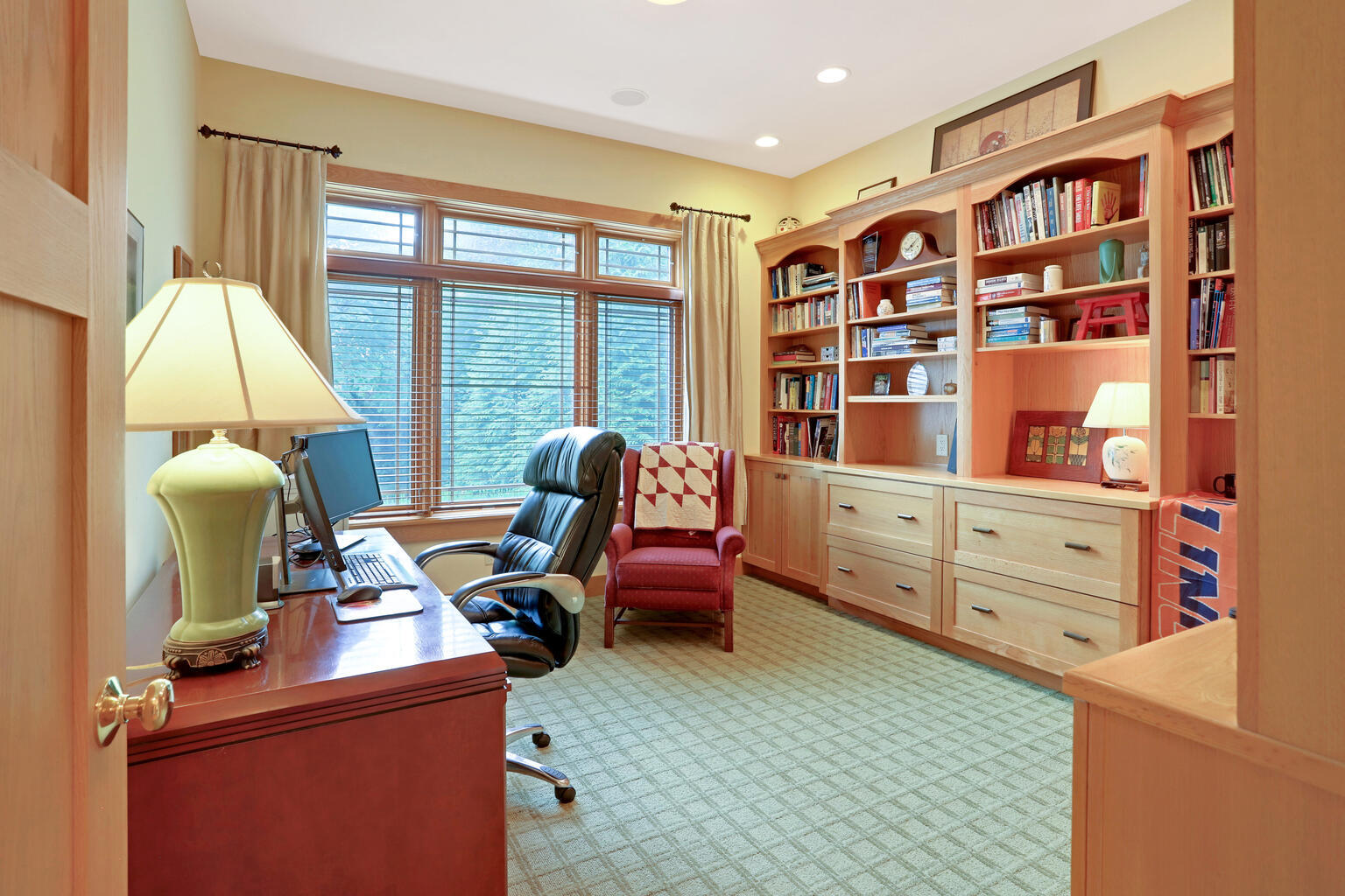 1011 West Charles Street Champaign, IL 61821 - Photo 15 of 51 a view of a workspace with furniture and a window